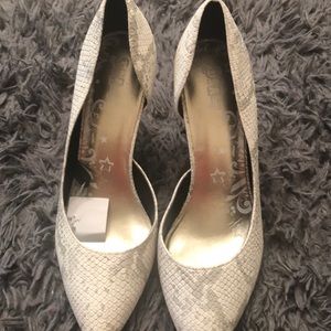 Snake skin pointy heels